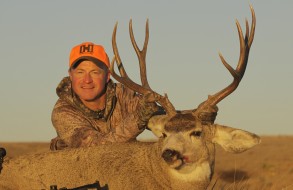 DDH TV co-host Mark Kayser and a western mule deer buck he toppled testing the new Hornady ELD-X bullet. (Photo copyright Mark Kayser)